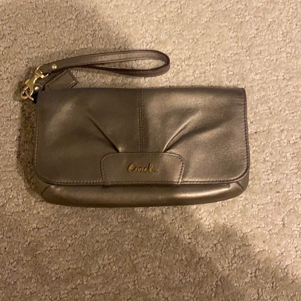 Gold coach wristlet only used a few times